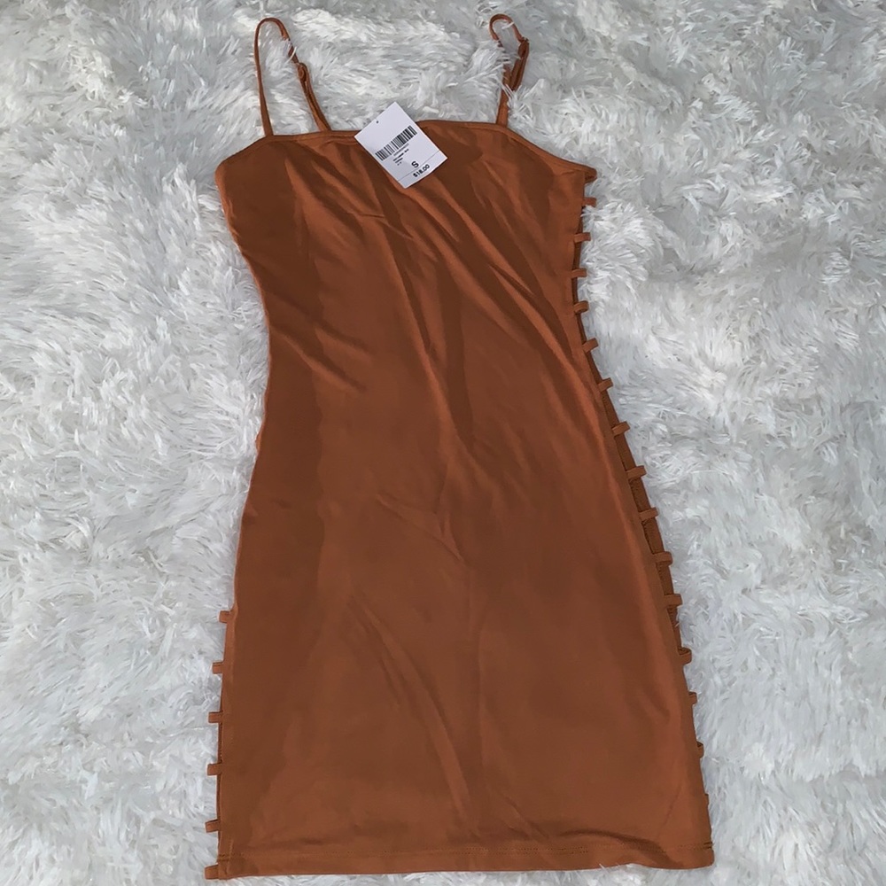Body con mini dress with cutouts on the side